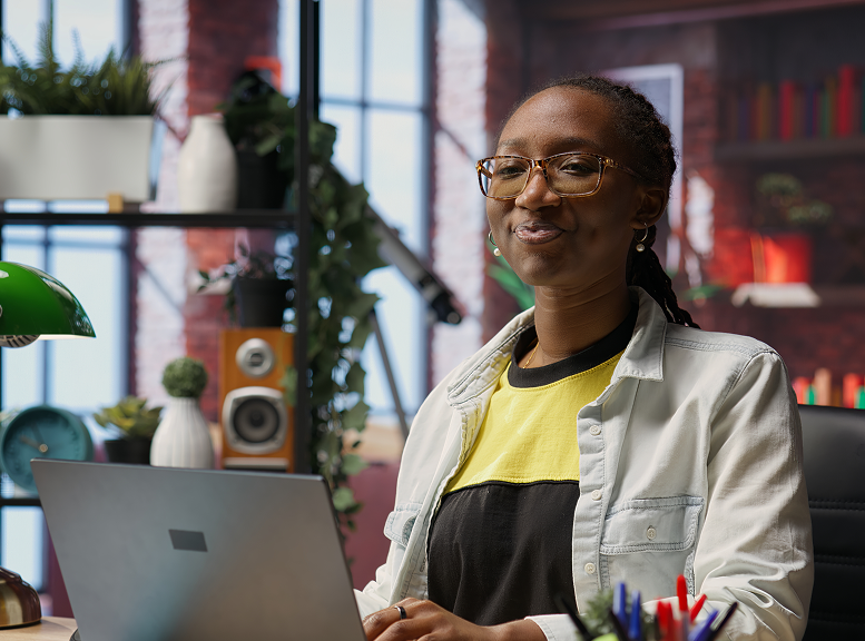 Smiling woman at desk
